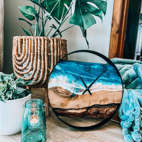 Live edge ocean epoxy clock framed with a round metal ring